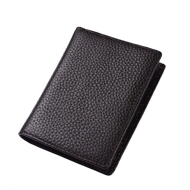 Black textured leather wallet with a sleek bi-fold design on a white background