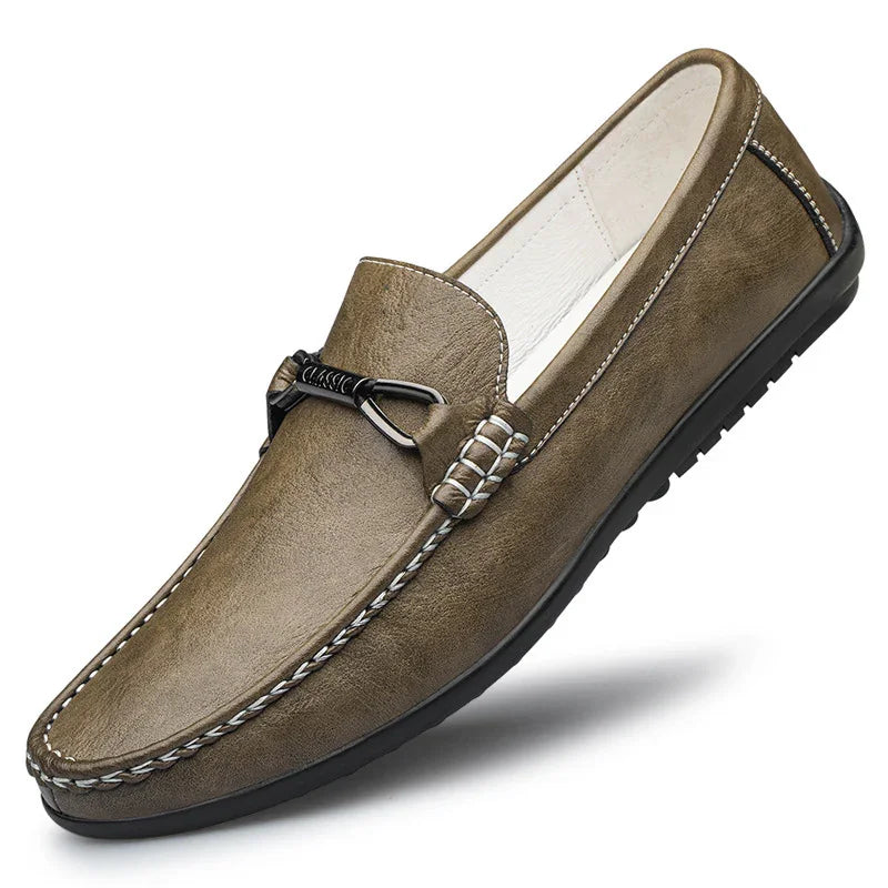 Men's brown leather classic driving loafer with black rubber sole and metal bit detail