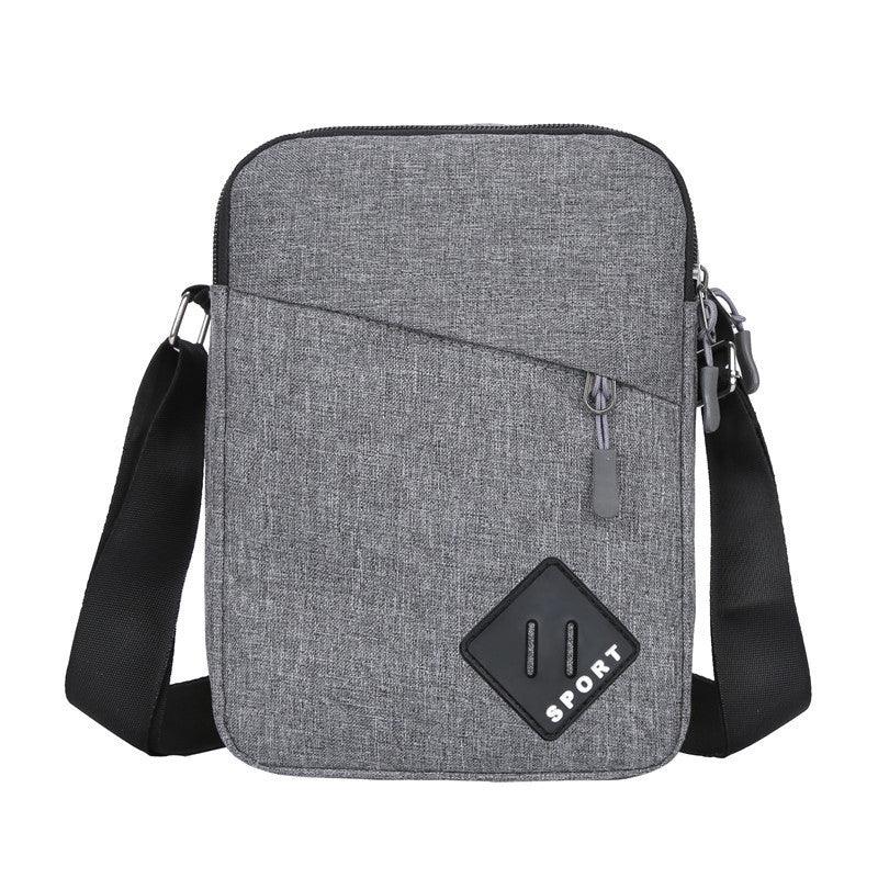 Gray sport crossbody shoulder bag with black adjustable strap and front zip pocket