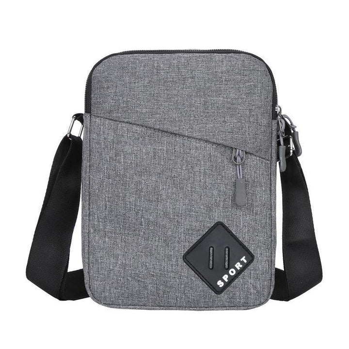 Gray sport crossbody shoulder bag with black adjustable strap and front zip pocket