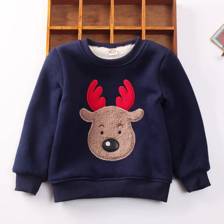 Navy blue kids sweater with a fuzzy reindeer face and bright red antlers, cozy winter wear