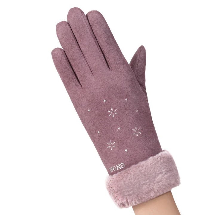 Mauve winter glove with faux fur cuff and silver snowflake embellishments on white background