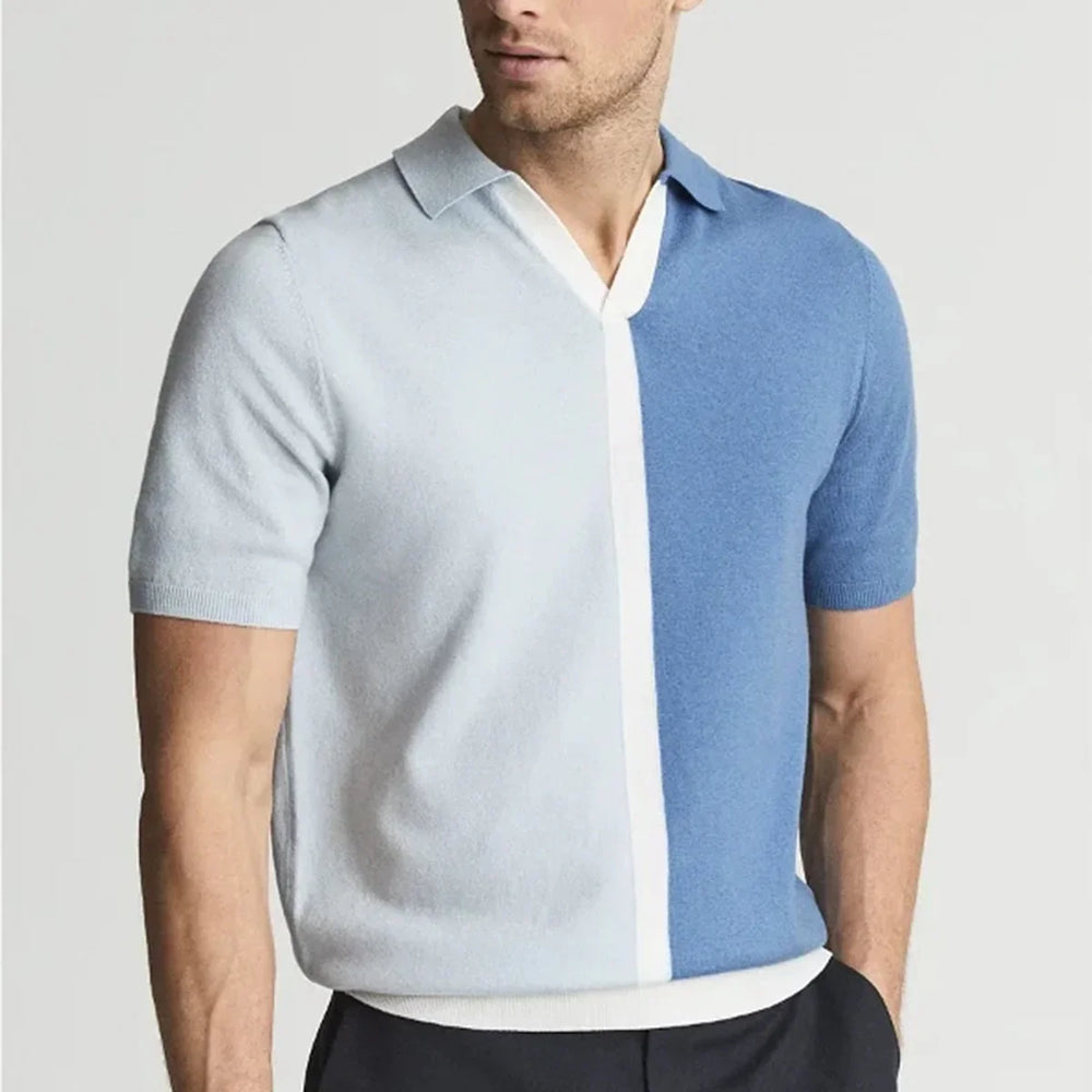 Men's short sleeve polo shirt with color block design in light blue and blue with white detail