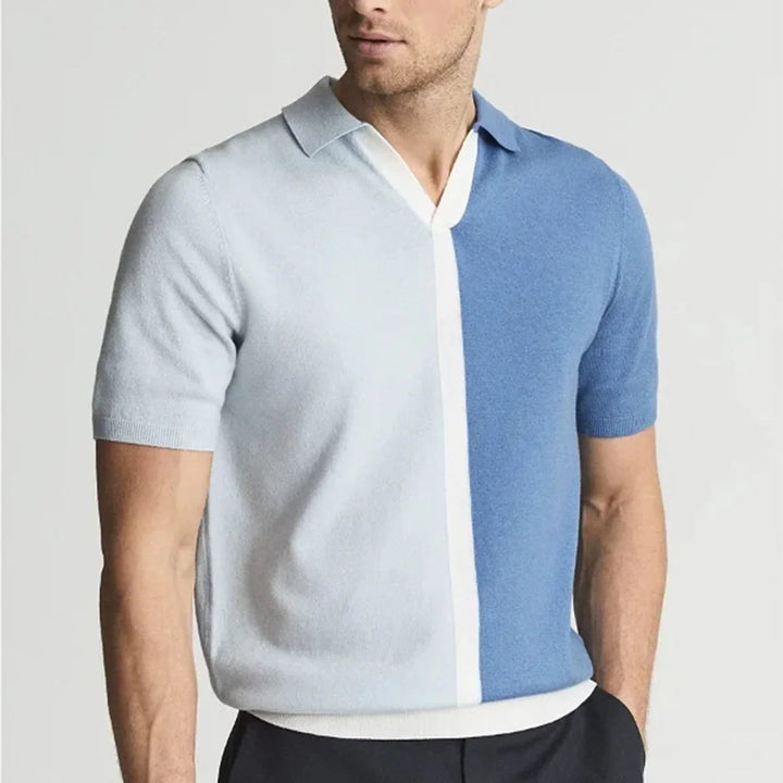 Men's short sleeve polo shirt with color block design in light blue and blue with white detail