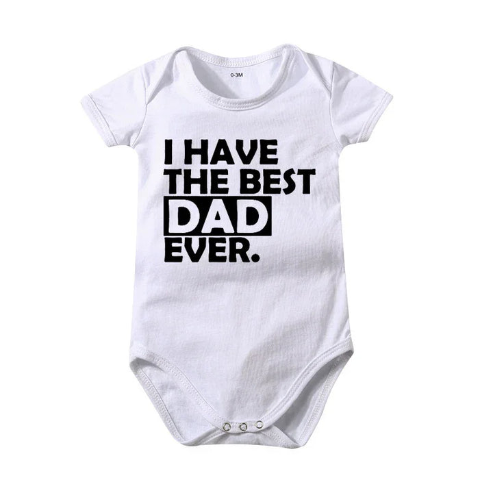 White baby onesie with black text saying I HAVE THE BEST DAD EVER in bold letters