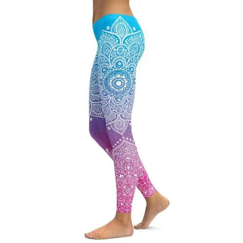 Side view of woman wearing colorful gradient mandala print leggings in blue, purple, and pink