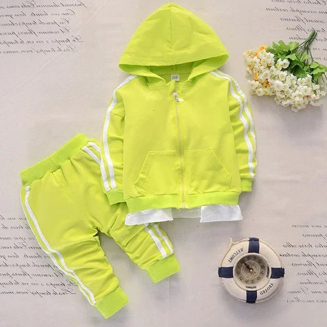 Bright yellow toddler tracksuit with zip-up hoodie and matching pants with white stripes
