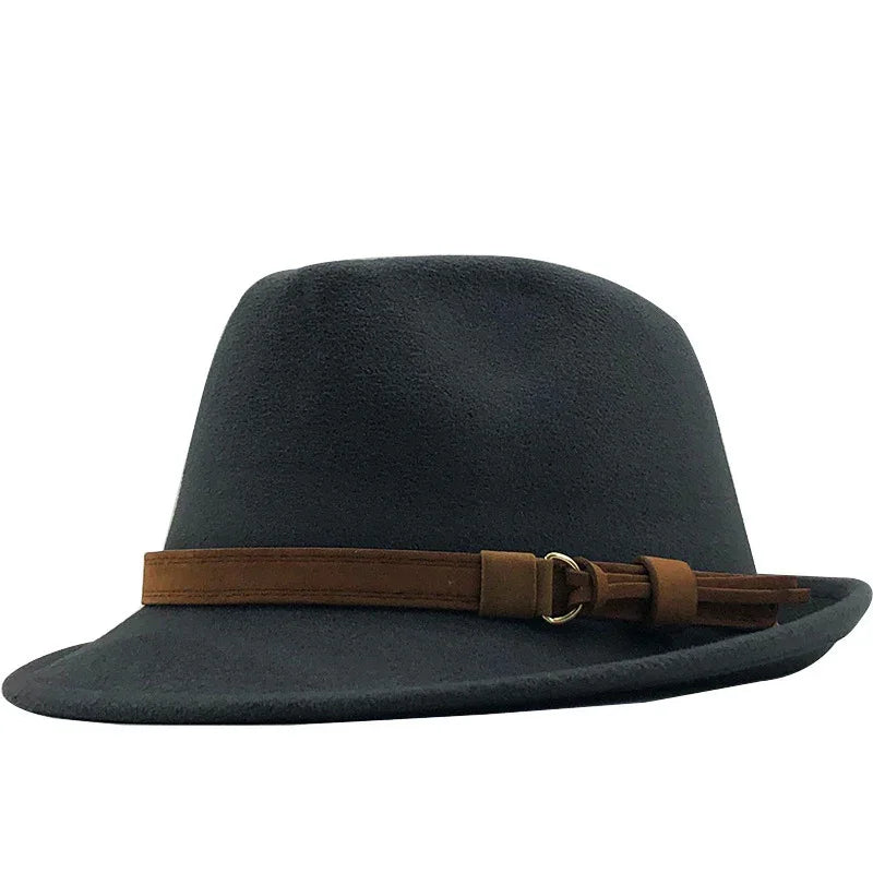 Black fedora hat with brown leather band and tassel detail on white background