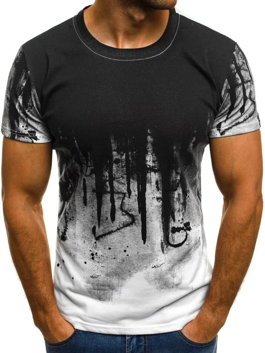 Men's black and white gradient t-shirt with abstract paint drip design, worn with jeans