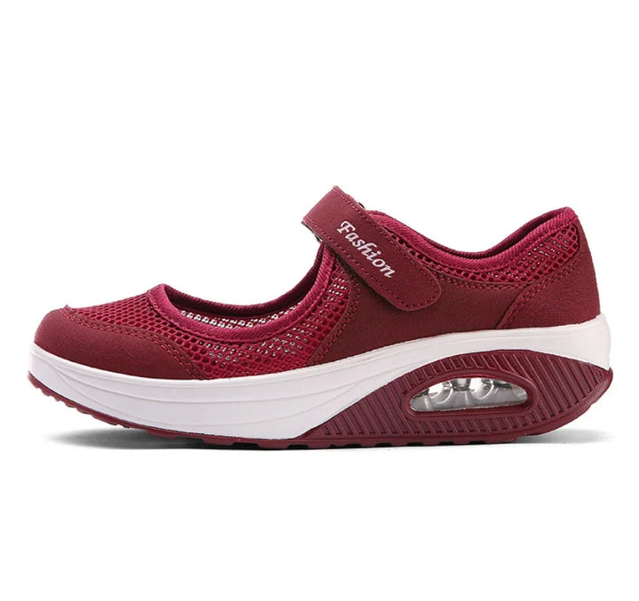 Red mesh breathable Mary Jane sneaker with white platform sole and air cushion heel