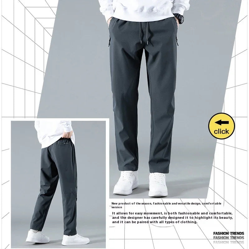 Men's black casual trousers with drawstring paired with white sneakers and white sweatshirt