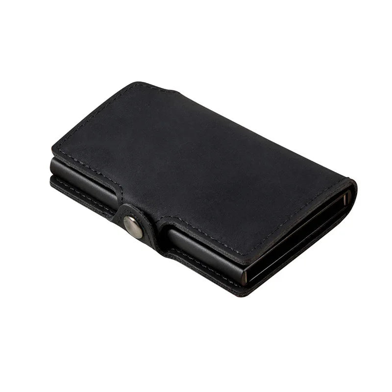 Black leather wallet with snap button closure on white background