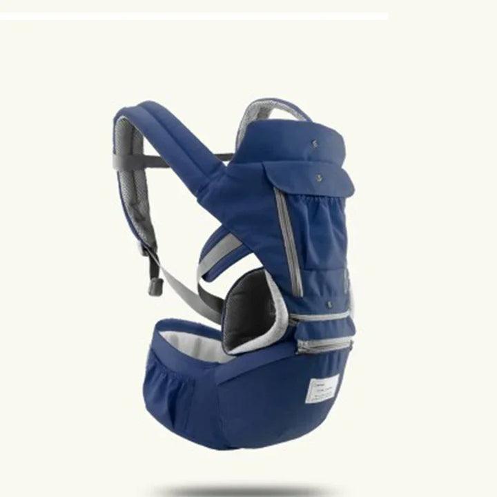 Navy blue ergonomic baby carrier with padded straps and storage pockets against white background