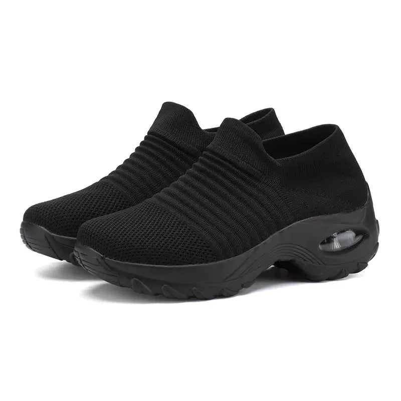 black slip-on breathable knit sneakers with air cushion sole for women