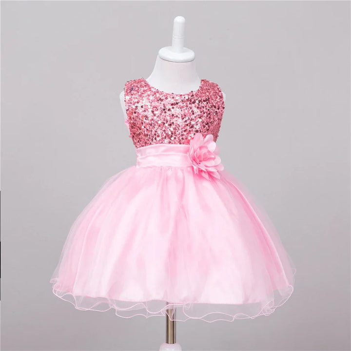 Pink sleeveless toddler dress with sequin bodice and tulle skirt on mannequin
