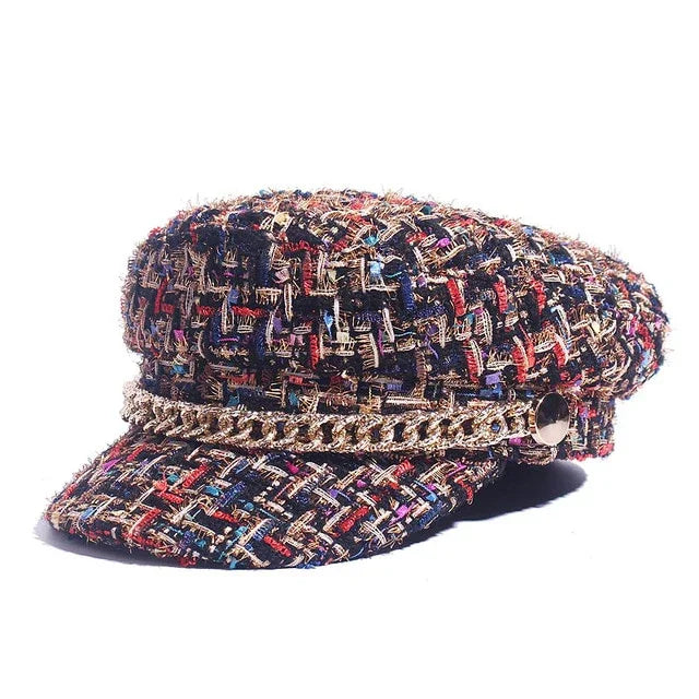 Women's tweed baker boy cap with multicolor threads and decorative gold chain detail