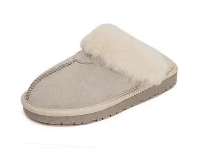Beige slip-on slipper with soft faux fur lining and durable sole for indoor comfort