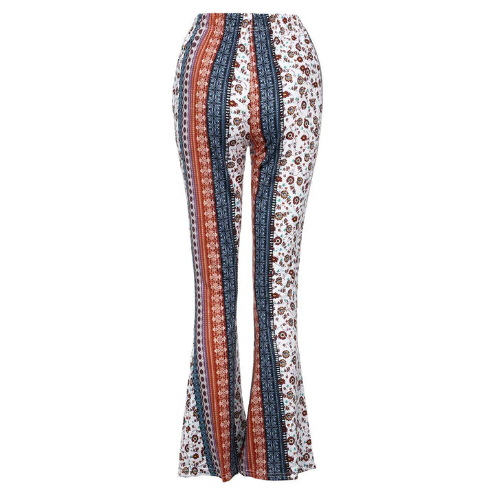 Boho-style flared pants with vertical navy, rust, and white floral stripe pattern