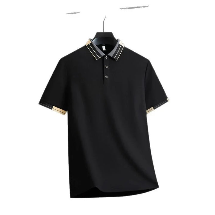 Black polo shirt with striped collar and sleeve cuffs on black hanger against white background