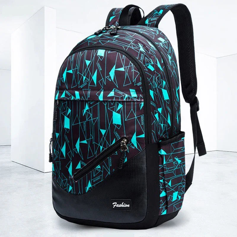 Black and blue geometric pattern backpack with multiple zippered compartments and padded shoulder straps