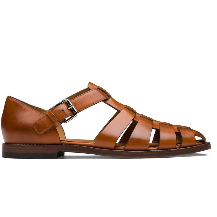 brown leather fisherman sandal with buckle strap and closed heel on white background