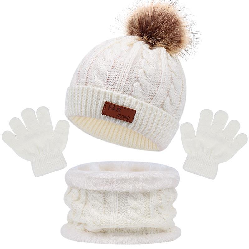 White knitted winter set with pom-pom beanie, gloves, and cozy neck warmer