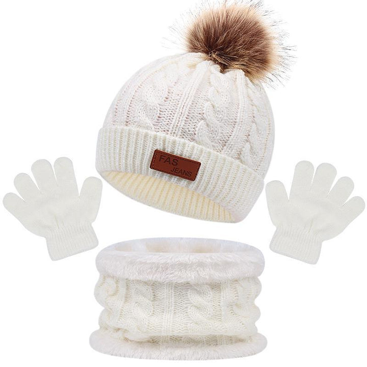 White knitted winter set with pom-pom beanie, gloves, and cozy neck warmer