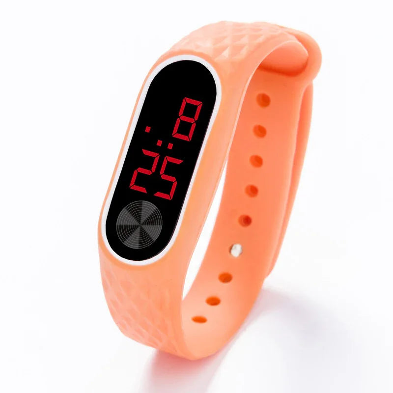 Orange digital sports wristwatch with red LED time display and textured silicone band