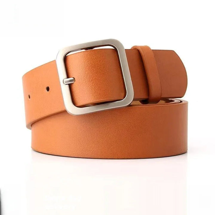 Tan leather belt with square silver buckle on white background