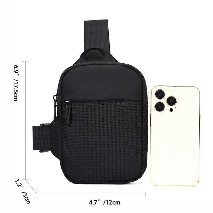 Compact black arm pouch with zipper pocket beside smartphone, measuring 6.9x4.7 inches