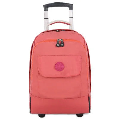 Coral pink rolling suitcase with front pocket and black retractable handle on white background