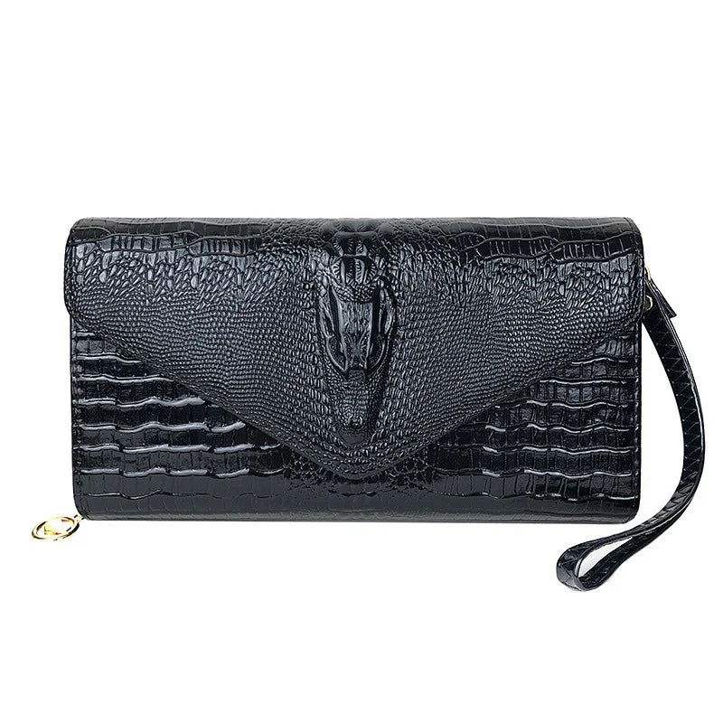 Black crocodile leather clutch wristlet wallet with textured flap and gold zipper