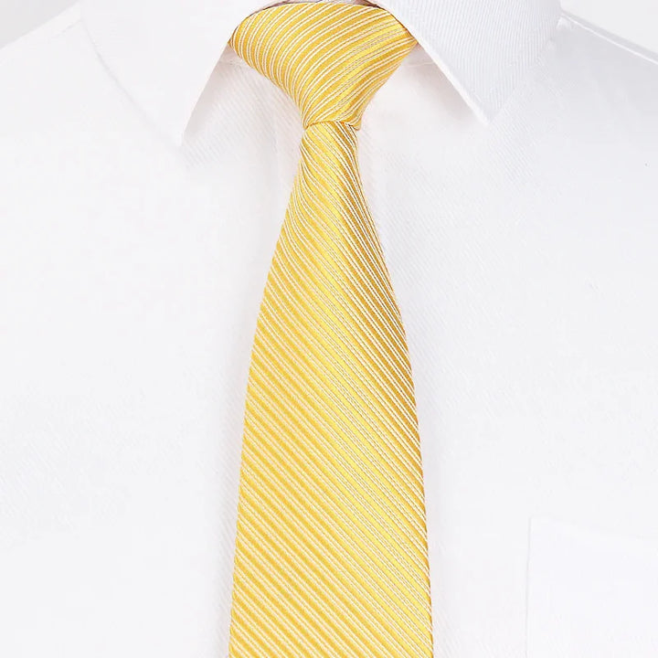 Yellow striped silk tie on white dress shirt with classic collar