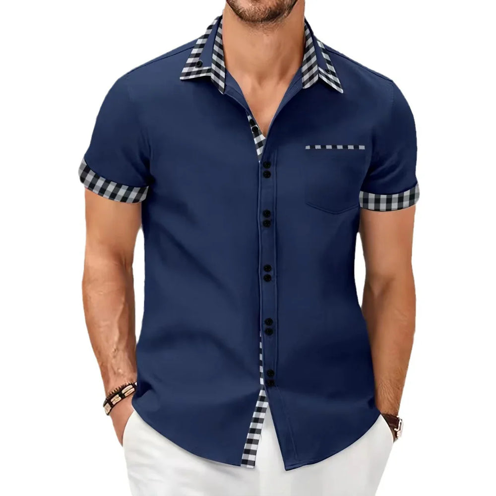 Men's navy blue short sleeve button-up shirt with black and white checkered collar and trim