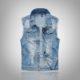 Sleeveless light blue denim jacket with button closures and chest pockets on white background