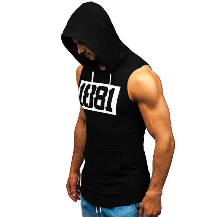 Muscular man wearing black sleeveless hooded gym tank top with white 1881 print and blue jeans