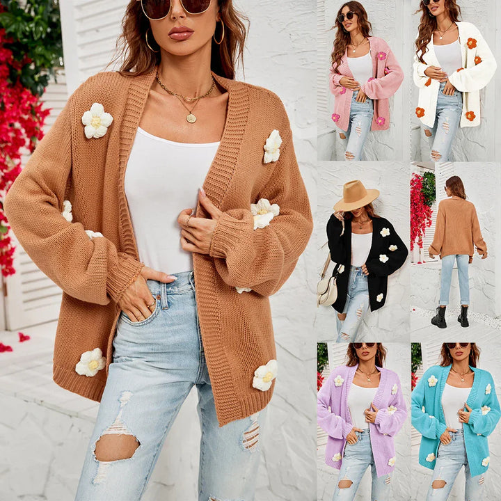 Women wearing oversized knit cardigans with 3D flower appliques in various colors styled with white tops and ripped jeans