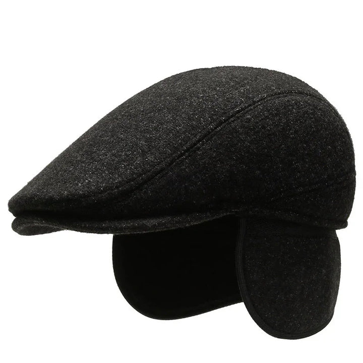 Black winter flat cap with ear flaps made of textured wool fabric