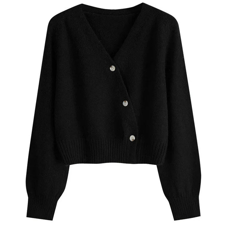 Black cropped V-neck cardigan sweater with asymmetrical button closure and ribbed cuffs