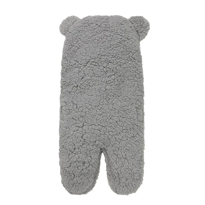 Gray soft textured plush bear-shaped pillow with ears on white background