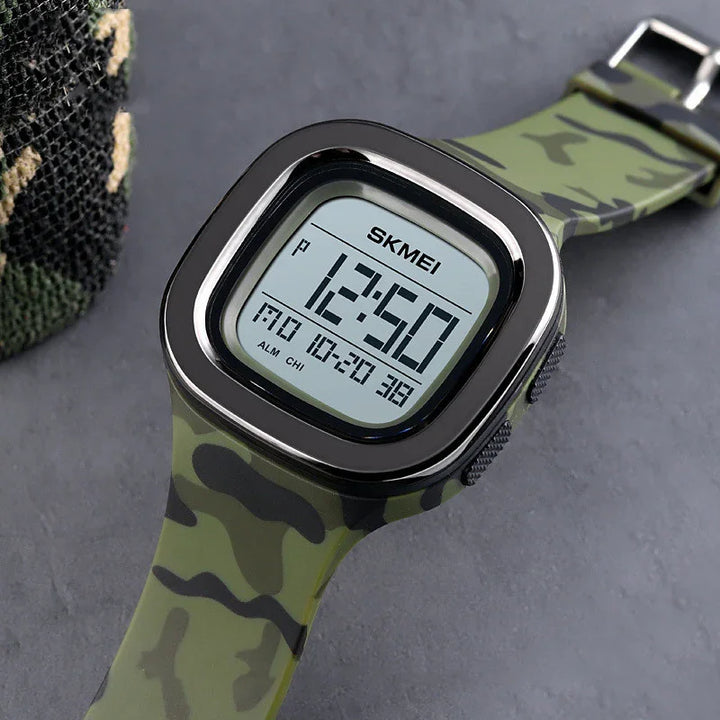 SKMEI digital wristwatch with camouflage strap displaying time 12:50 on gray background