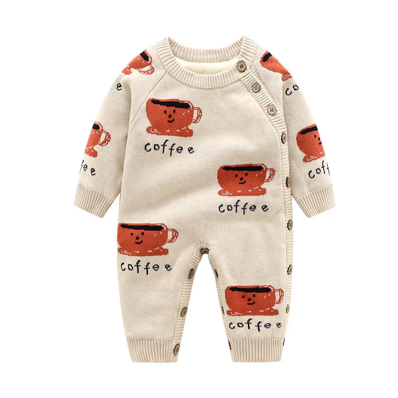 Beige baby onesie with smiling coffee cup pattern and front button closure