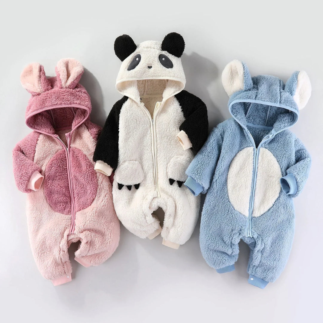 Three plush baby animal onesies in pink bunny, panda, and blue bear designs with hoods and ears