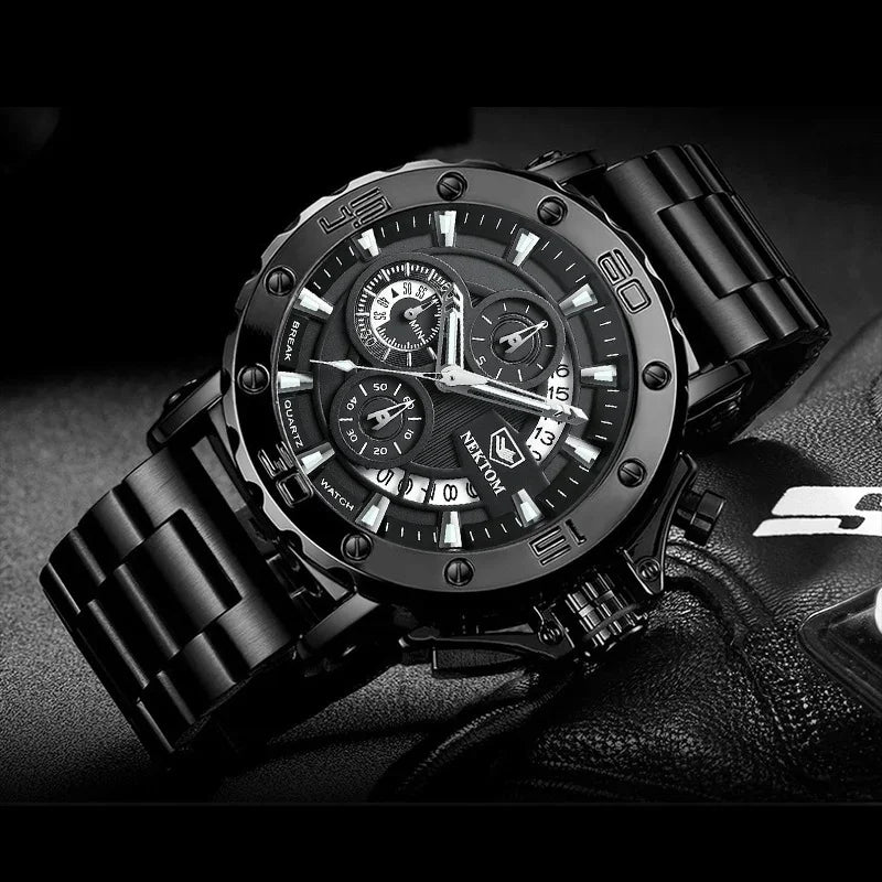 Black Nektom men's wristwatch with multi-dial chronograph and metal link bracelet on textured surface