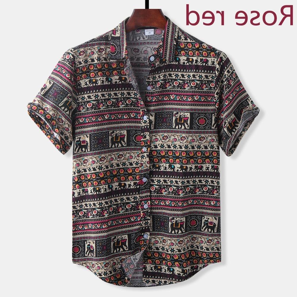 Men's short sleeve button-up shirt with colorful elephant and floral tribal print on dark background