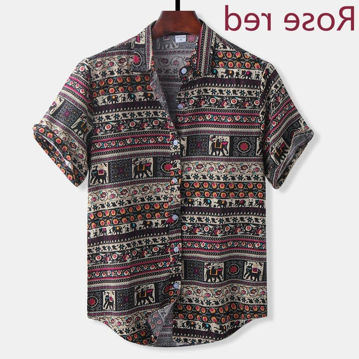 Men's short sleeve button-up shirt with colorful elephant and floral tribal print on dark background