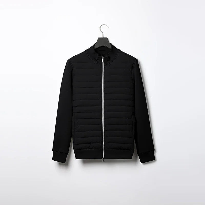 Black quilted bomber jacket with full front zipper displayed on hanger against white background