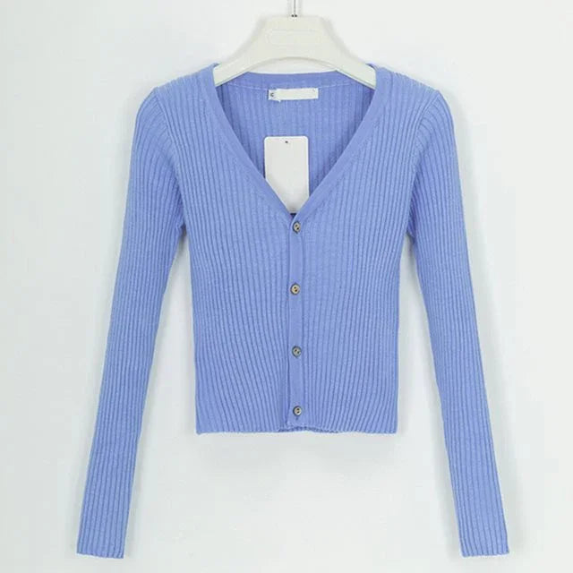 Light blue ribbed knit cardigan with buttons on white hanger against white background
