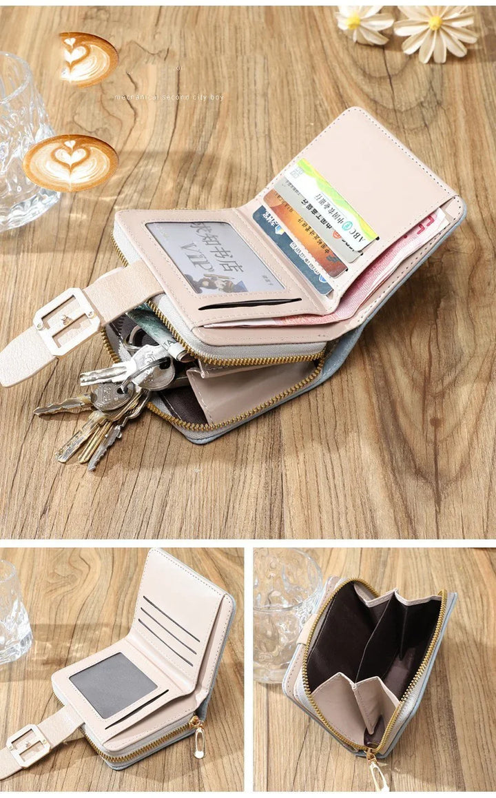 Light pink leather wallet with zipper, card slots, clear ID window, and key holder on wooden table