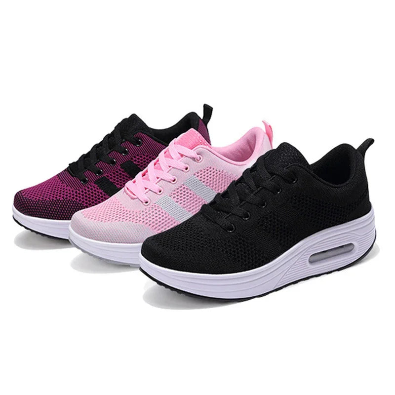 Three pairs of lightweight breathable mesh athletic sneakers in black, pink, and purple with white soles